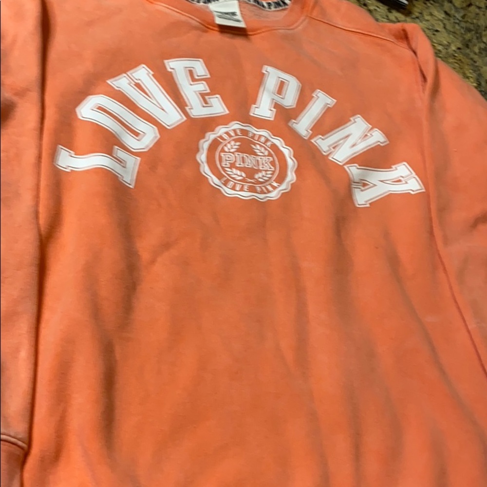 Pink Victoria’s Secret sweatshirt. Size XS